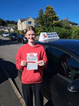 When entering any car park, stay slow (1st gear) and if driving forward into a bay on the right, stay over to the left so you get a good swing, signal, then when your right door mirror lines up with the first line of the bay you´re driving into, turn the wheel and gently cover the brake as you straighten up and stop. If you are over the bay line, just ask can you reverse out and put it back 